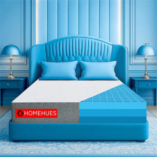 A cross-section of a mattress on a blue bed, showing its innovative layers. It’s an ideal home furnishing item for a modern bedroom.
