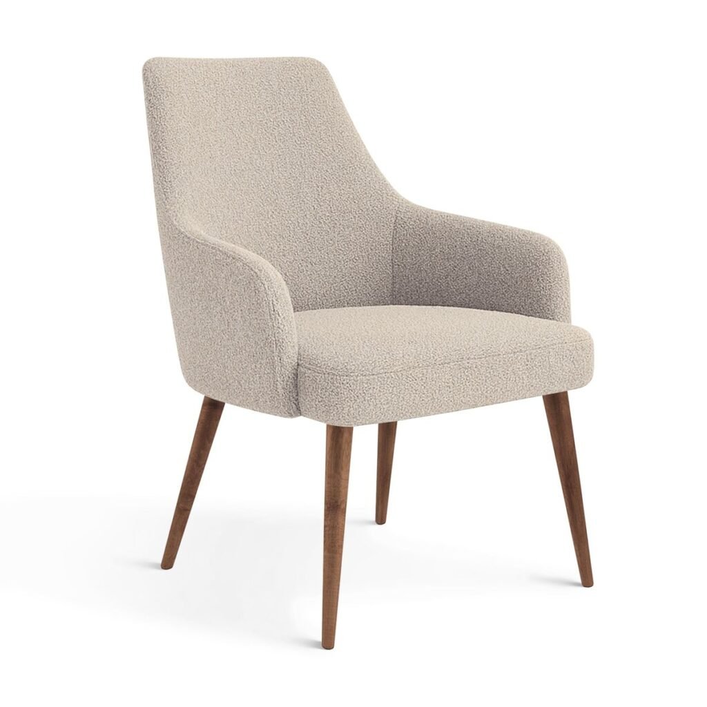 Elegant upholstered chair with wooden legs, designed for modern home furnishing to add comfort, style, and sophistication to interiors.