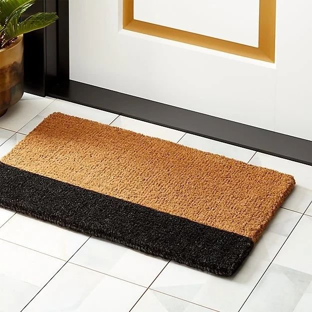 Two-tone brown and black door mat designed for modern home furnishing, adding style, durability, and elegance to entryways.